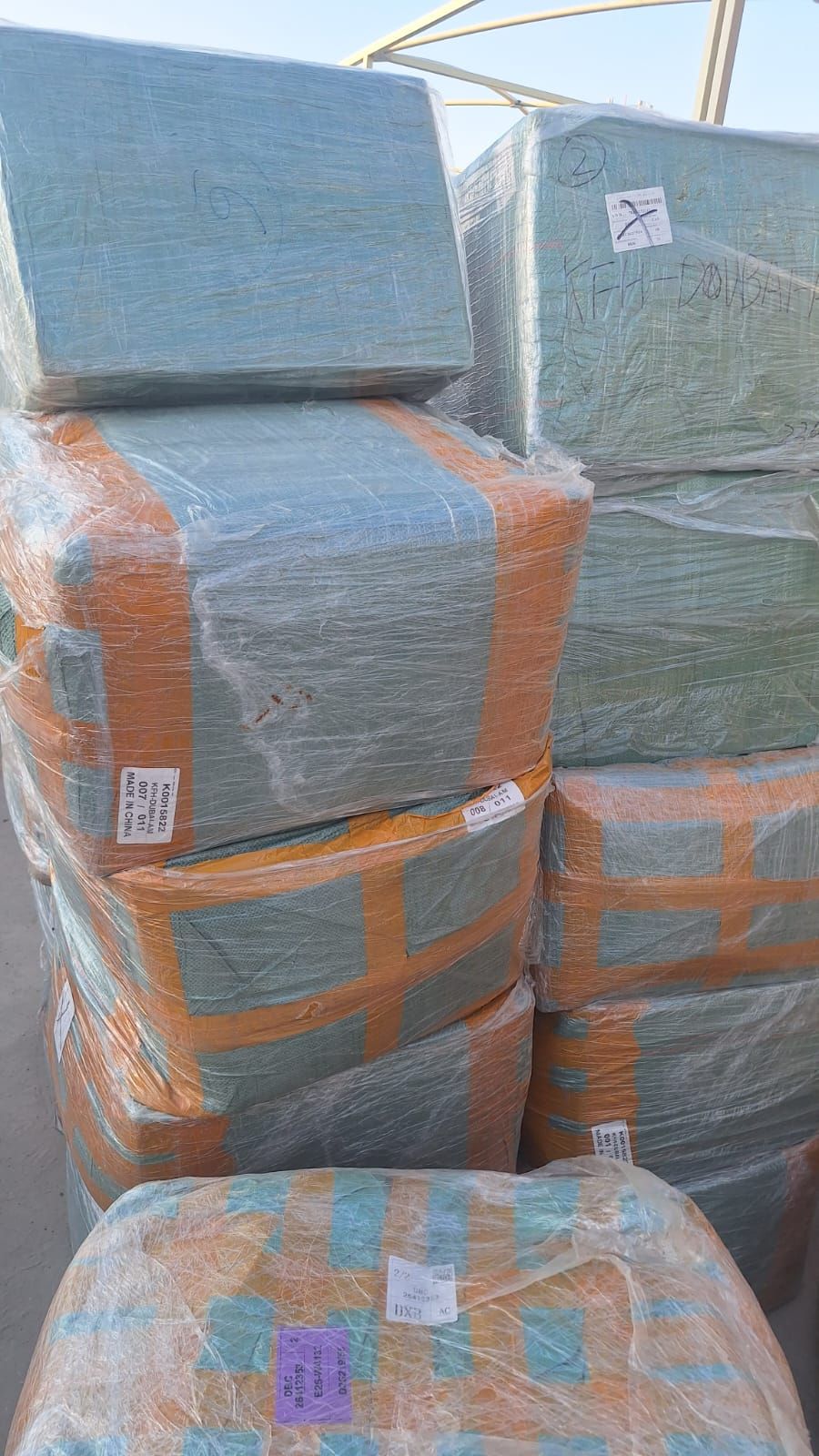 Parcels wrapped in protective film and stacked